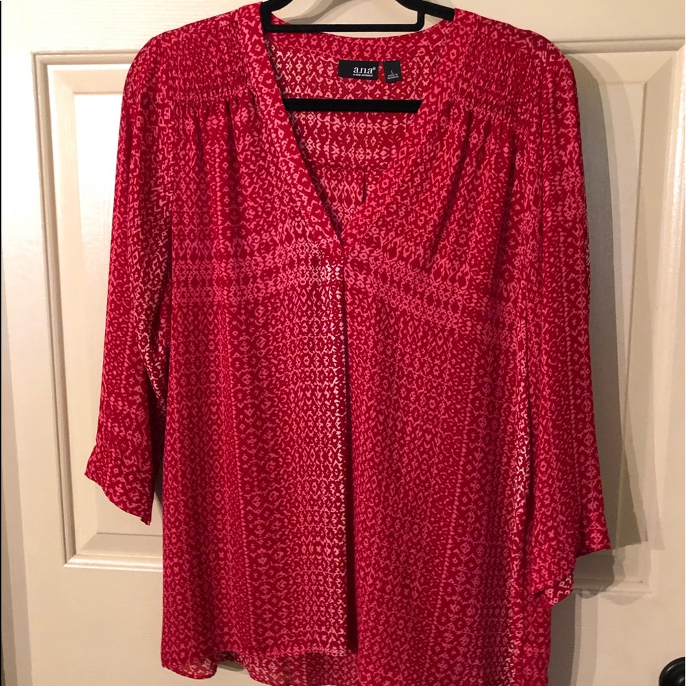 Women’s red patterned blouse
